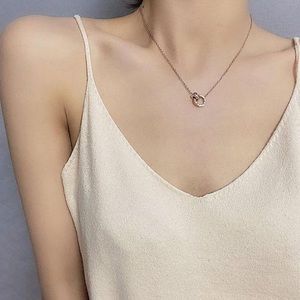 Infinity Rings Roman Numerals Necklace